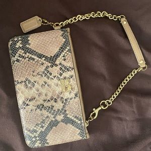 Perfect dainty Coach snakeskin wristlet